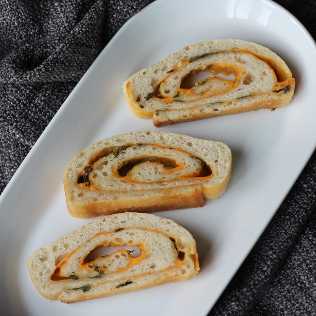 Bored herb and garlic cheese roll.